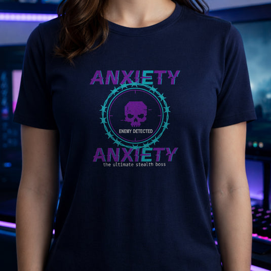 Translation missing: en.Purple and teal pixelated glitch text reading Anxiety Enemy Detected on a navy graphic gamer tee