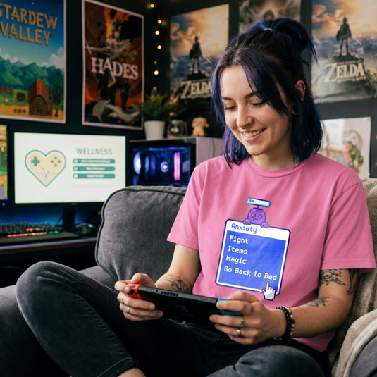 Translation missing: en.Azalea t-shirt featuring a retro blue RPG battle menu box titled Anxiety with option Go Back to Bed