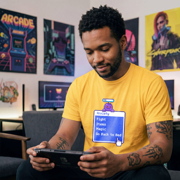 Translation missing: en.Daisy t-shirt featuring a retro blue RPG battle menu box titled Anxiety with option Go Back to Bed