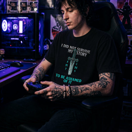 Translation missing: en.Black t-shirt with a fantasy sword in the ground, glowing runes, and a motivational story survivor quote