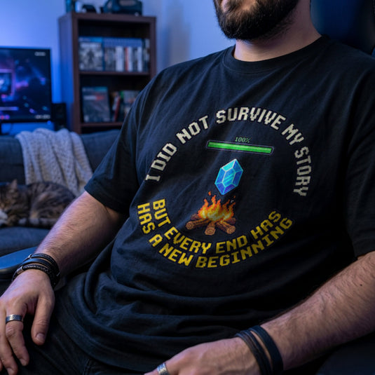 Translation missing: en.Black gamer mental health t-shirt featuring a pixel bonfire checkpoint graphic with a hopeful recovery quote