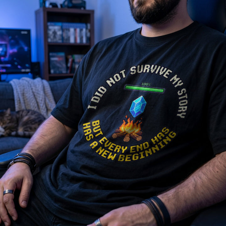 Translation missing: en.Black gamer mental health t-shirt featuring a pixel bonfire checkpoint graphic with a hopeful recovery quote