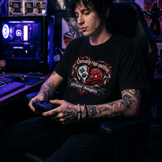 Translation missing: en.Black t-shirt featuring a broken controller heart with text: Currently rage-quitting intrusive thoughts