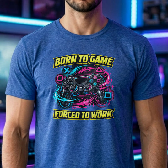 Translation missing: en.Heather royal t-shirt with a neon controller graphic and yellow text Born to Game Forced to Work in banner fonts