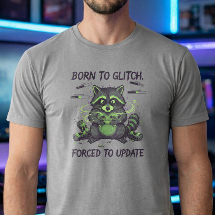 Translation missing: en.Funny gamer raccoon holding a controller on a sports grey t-shirt with text Born to Glitch, Forced to Update
