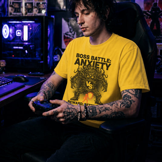 Translation missing: en.Daisy t-shirt with a black line-art monster graphic reading Boss Battle: Anxiety vs a player with a orange shield