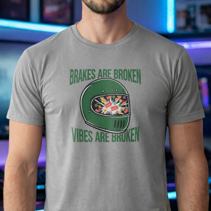 Translation missing: en.Green racing helmet graphic on a sports grey t-shirt with text Brakes Are Broken Vibes Are Broken