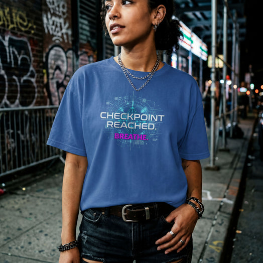 Royal t-shirt with cyan tech HUD graphic reading "CHECKPOINT REACHED." and pink text reading "BREATHE."