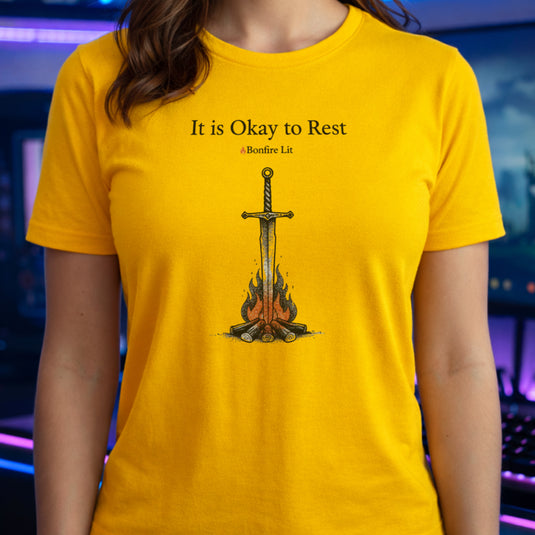 Translation missing: en.Daisy t-shirt with a sword in a bonfire graphic and text reading It is Okay to Rest and Bonfire Lit