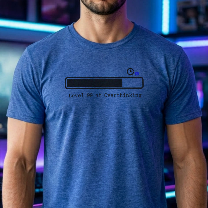 Translation missing: en.Heather royal t-shirt with a loading bar graphic and typewriter text reading Level 99 at Overthinking