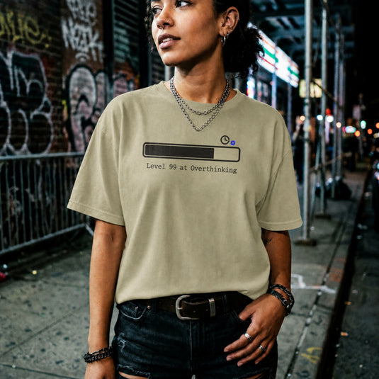Translation missing: en.Natural t-shirt with a loading bar graphic and typewriter text reading Level 99 at Overthinking