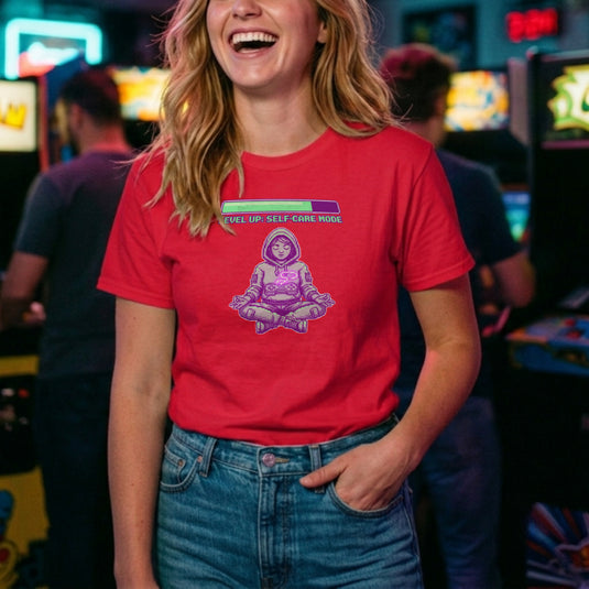Translation missing: en.Alt n Vibe red women's t-shirt with a pixel art girl meditating in a hoodie under a Level Up Self Care Mode loading bar
