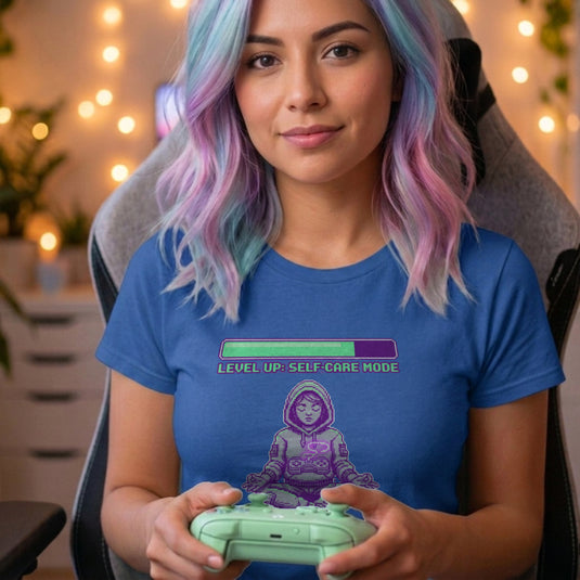Translation missing: en.Alt n Vibe royal women's t-shirt with a pixel art girl meditating in a hoodie under a Level Up Self Care Mode loading bar