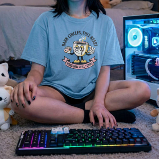 Translation missing: en.Alt n Vibe light blue woman's t-shirt with a vintage cartoon coffee mug holding a gaming controller and flashing a peace sign