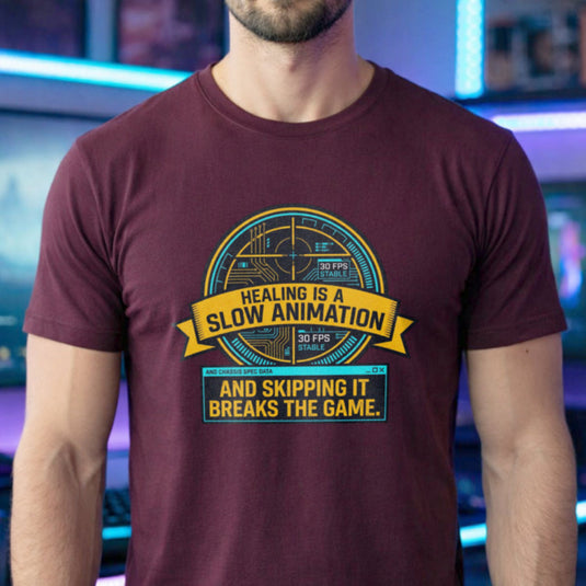 Translation missing: en.Maroon t-shirt with yellow and cyan tech HUD UI graphic and text: Healing is a slow animation, skipping it breaks game