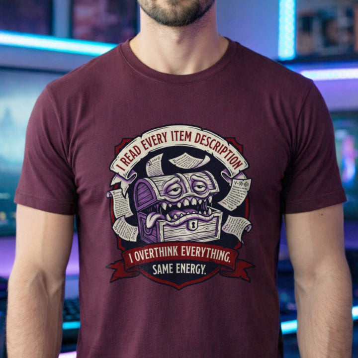 Translation missing: en.Maroon t-shirt with an RPG mimic chest graphic surrounded by scrolls reading I Read Every Item Description
