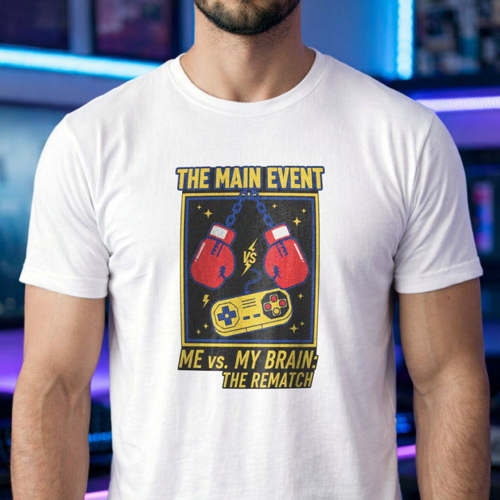 Translation missing: en.White tee with boxing gloves and retro controller graphic, text reading The Main Event Me vs. My Brain: The Rematch
