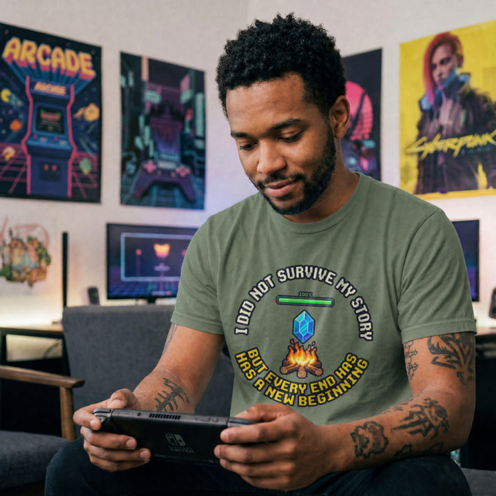 Translation missing: en.Military green gamer mental health t-shirt featuring a pixel bonfire checkpoint graphic with a hopeful recovery quote