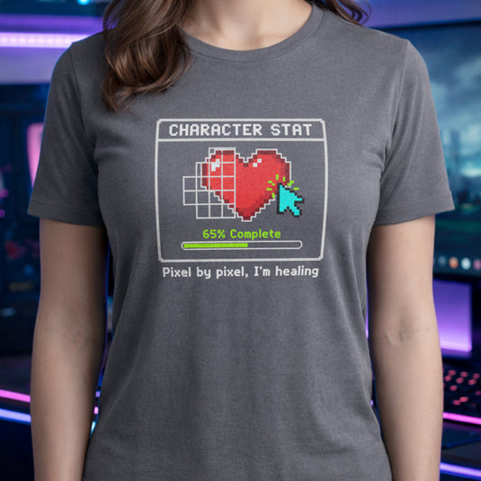 Translation missing: en.Graphite Heather t-shirt with pixel art heart stat box reading 65% Complete and text Pixel by pixel, I'm healing