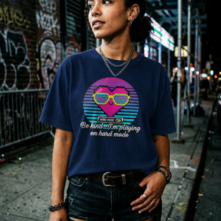Translation missing: en.Navy t-shirt with a retro pixel heart in sunglasses and text Be kind I'm playing on hard mode