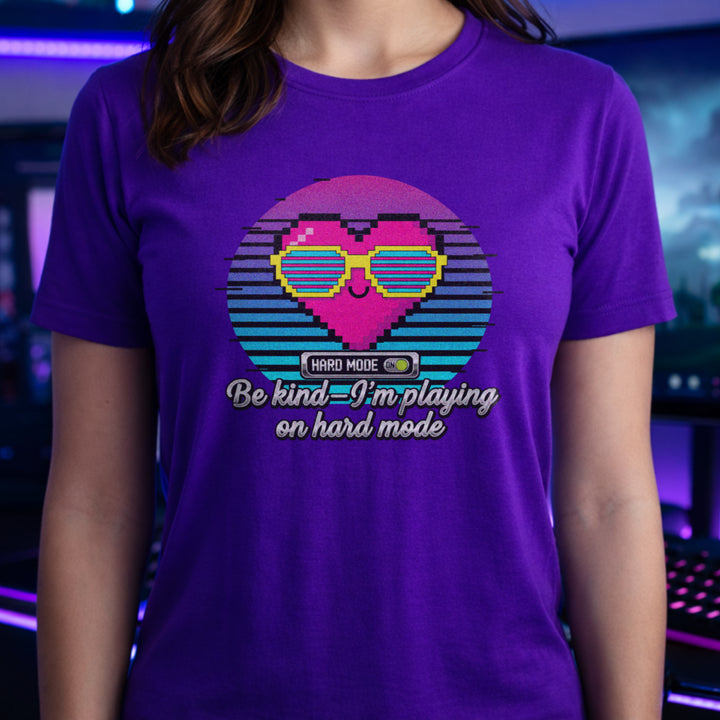 Translation missing: en.Purple t-shirt with a retro pixel heart in sunglasses and text Be kind I'm playing on hard mode