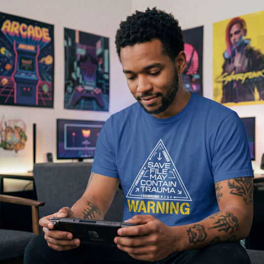 Translation missing: en.Royal shirt featuring sci-fi triangle warning graphic with text: Save File May Contain Trauma and WARNING label