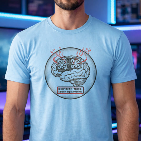 Translation missing: en.Light blue t-shirt graphic with a smoking brain cooling unit reading COMPONENT FAILURE: Sensory Input Overload