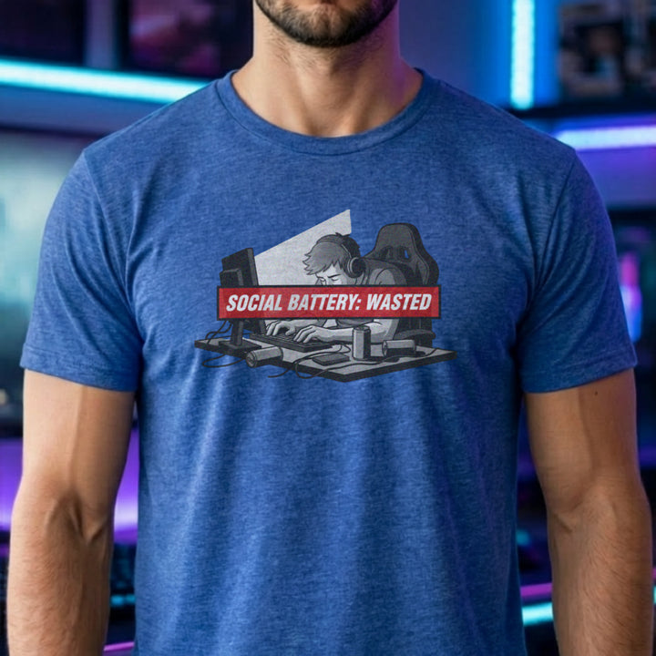 Translation missing: en.Heather royal t-shirt with tired gamer slumping at desk with headphones  and red banner reading Social Battery: Wasted