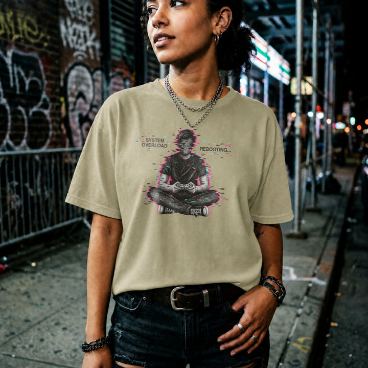Translation missing: en.Natural t-shirt showing a glitch art gamer sitting cross-legged with System Overload Rebooting text