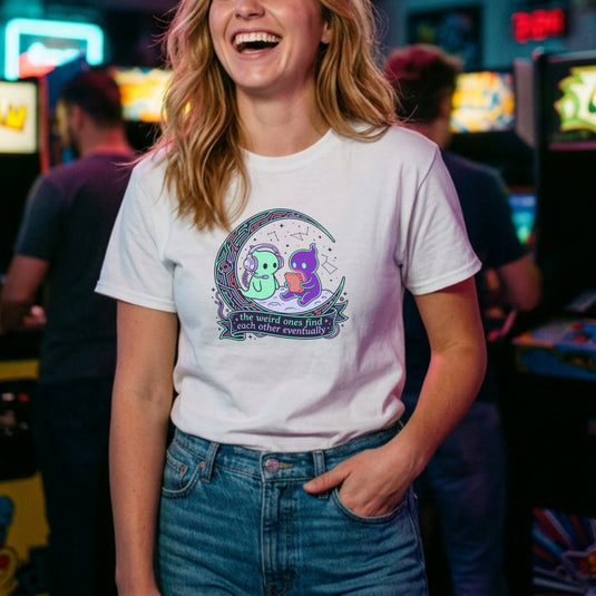 Translation missing: en.Alt n Vibe white women's t-shirt with two cute alien characters playing games under stars reading The Weird Ones Find Each Other
