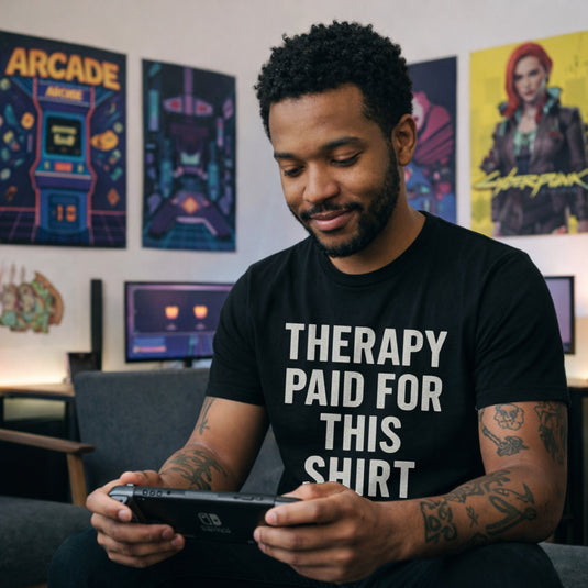 Translation missing: en.Black t-shirt printed with white bold text reading Therapy Paid For This Shirt