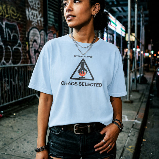 Translation missing: en.Alt n Vibe light blue t-shirt with warning triangle, hand pushing red button, and text reading Tutorial Skipped Chaos Selected
