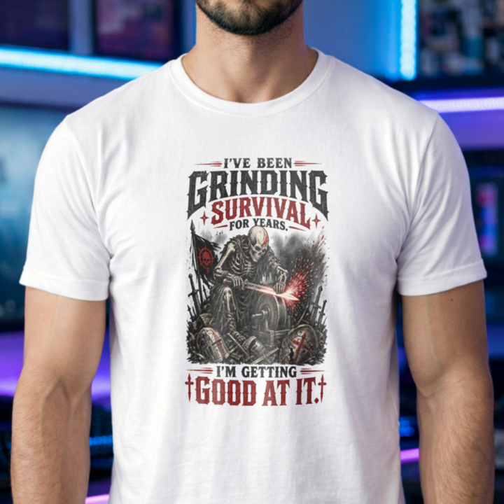 Translation missing: en.White t-shirt with skeleton warrior sharpening sword on grindstone graphic and text: Grinding survival for years