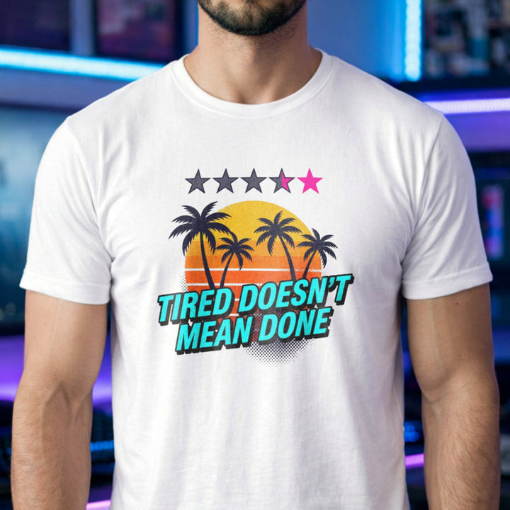Translation missing: en.White t-shirt with retro palm tree sunset graphic and text: Tired Doesn't Mean Done with 5-star rating graphic