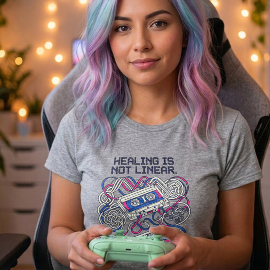 Translation missing: en.Alt n Vibe sports Grey women's t-shirt with a retro cassette tape, tangled pink and blue ribbon, and Healing Is Not Linear text