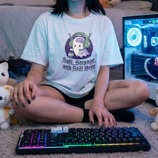 Translation missing: en.Alt n Vibe white women's t-shirt with a pixel art ghost wearing a headset and gothic text Soft, Strange, and Still Here