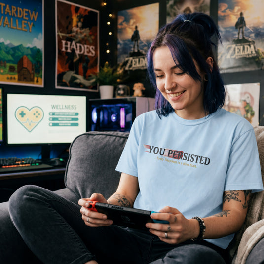 Translation missing: en.Light blue t-shirt with motion blur graphic text reading You Persisted: Every Respawn is a New Start