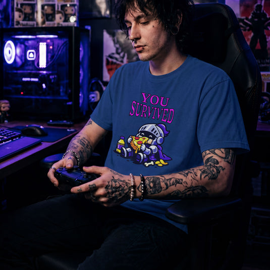 Translation missing: en.Royal t-shirt with Chibi knight sitting down eating pizza with potion bottle and text reading You Survived 
